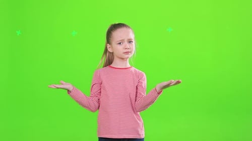 Pretty Little Girl Shrugging Shoulders in Confusion in Motion