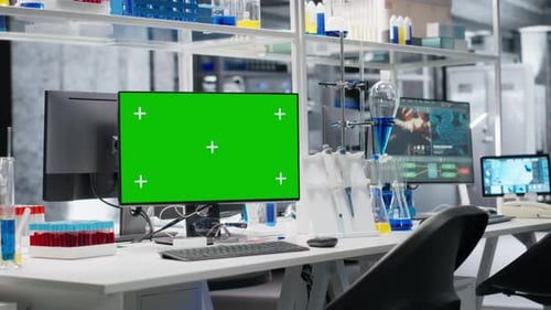 Blood Samples Next to Green Screen PC in Laboratory