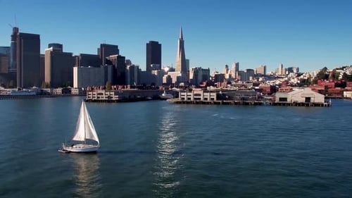 Sailboat Crosses Water by San Francisco Skyline 7 Above
