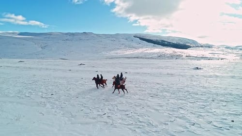 Winter Horseback Riding in Open Terrain