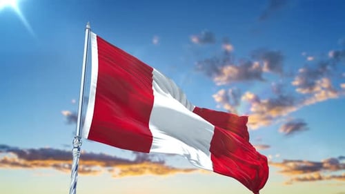 Peruvian Flag Waving Against Blue Sky
