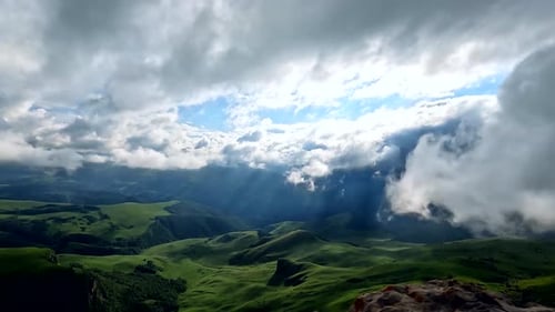 Timelapse of Beautiful Tropical Valley Between Mountains with Moving White Clouds in Sky