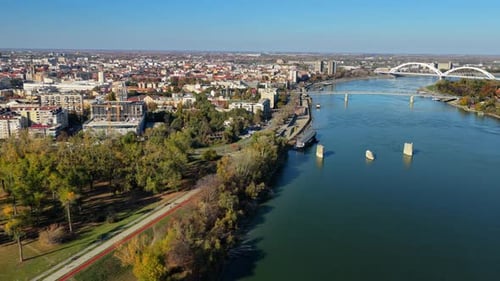 Aerial drone view of Novi Sad's skyline with the Danube River and its bridges in the foreground