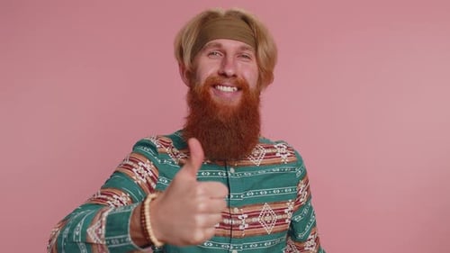 Bearded Man Raises Thumbs Up Agrees or Gives Positive Reply Recommends Advertisement Likes Good