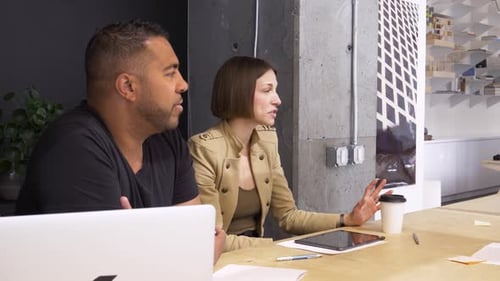 Business people discuss planning and teamwork in modern office meeting room