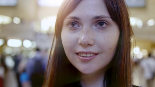 Beautiful Female Person Standing Out of The Crowd on Urban Street