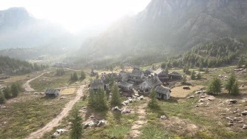 Aerial View of a Peaceful Mountain Village Valley