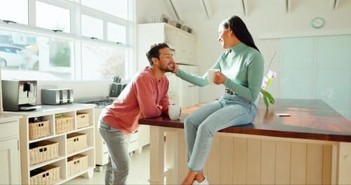 Loving Couple Enjoying Coffee in Modern Kitchen