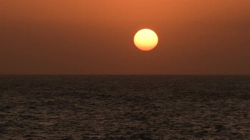 Sun Falling atSsunset in the Sea