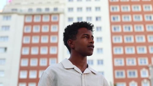 Young Adult Smiling in an Urban Setting