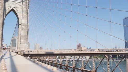 Brooklyn Bridge to Manhattan Downtown Cables and Blue Sky New York City Iconic Symbol Travel USA