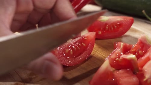 Dicing a Tomato on Wood Cutting Board