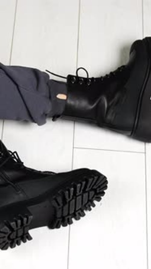 Elegant woman fashion shoes posing. Women footwear showroom. Vertical video