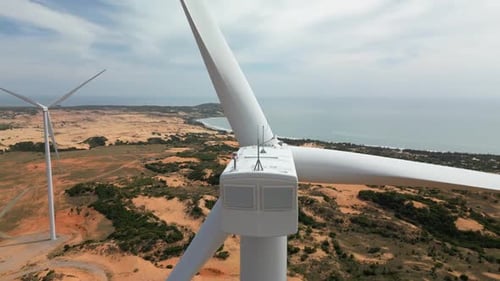 Large Wind Turbines with Blades in Field Aerial View Bright Sunset Blue Sky Wind Park in Bright