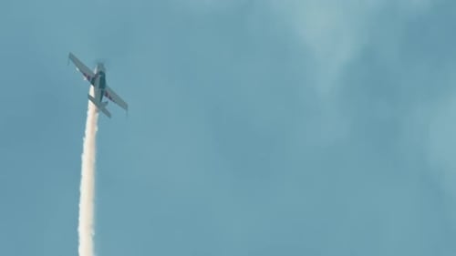 Aerobatics with White Smoke Trail