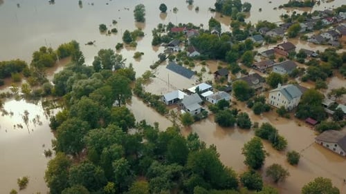 Aerial View of Houses Submerged in Flood Water