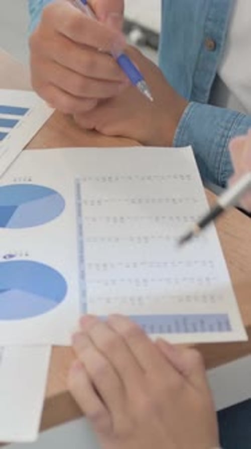 Close Up of People Doing Paperwork, vertical video