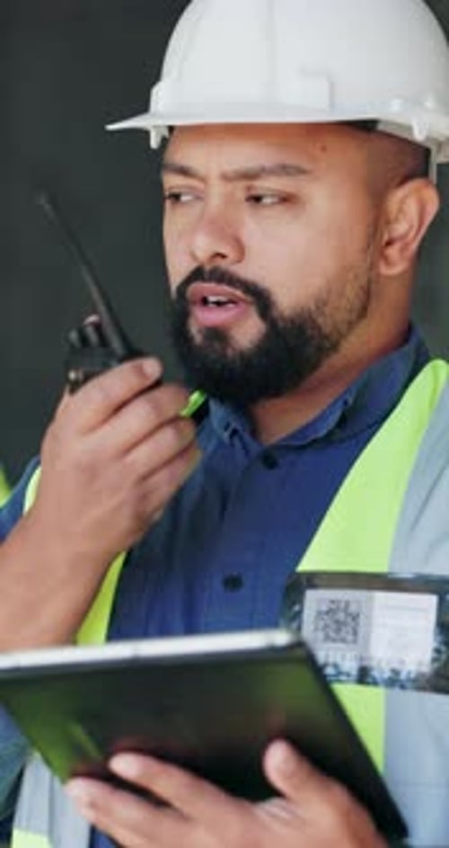 Tablet, radio and construction worker on site with research for building, renovation or repairs