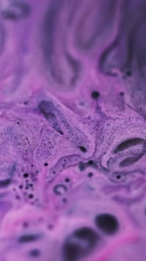 Swirling Purple Liquid Abstract Background