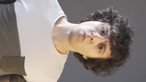 Vertical video of Angry and egoistic young man.
