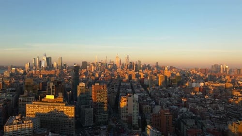 Bird's Eye View of Warm Sunlight Over Midtown Manhattan in New York City Sun Sets Over the Hudson