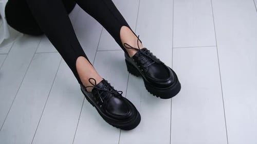 Woman Wearing Stylish Black Platform Oxford Shoes