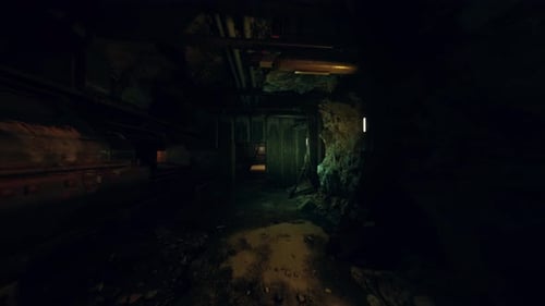 Gloomy Underground Passage Glowing with Intermittent Green Light