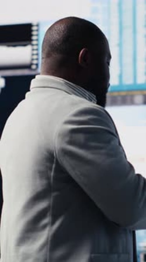Vertical Video African American Professional Reviews Financial Charts and KPI Projections
