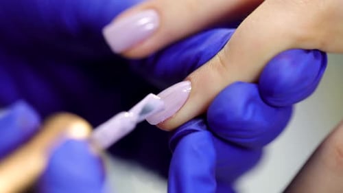 manicure done by a professional manicurist in slow motion