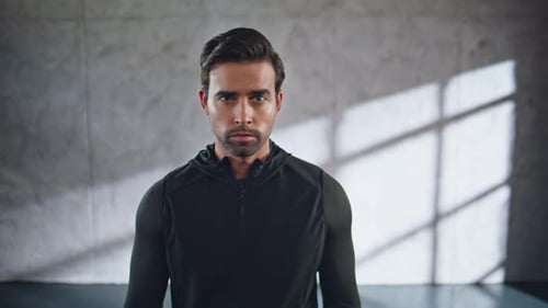 Portrait Tired Sportsman Posing Camera at Loft Gym Strong Man Resting Indoor