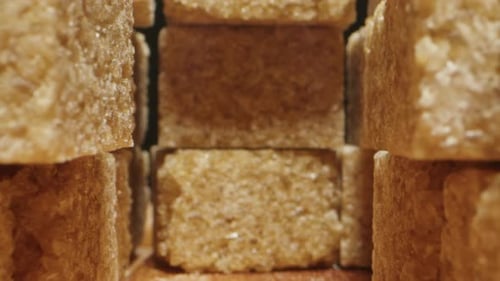 Cane Brown Sugar in Cubes Texture Closeup macroNatural Sweet Food Additive