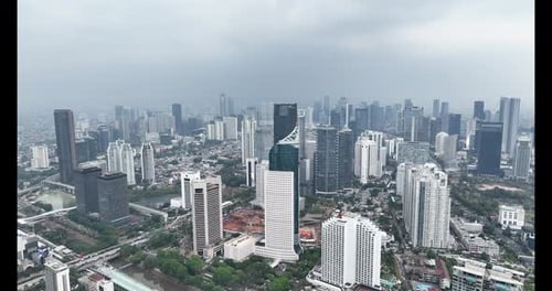 Aerial panoramic cityscape view of Jakarta.