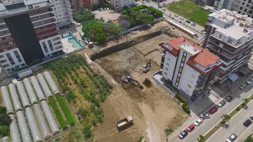 Aerial View Foundation Pit Filled Heavy Equipment Pours Concrete for New Building