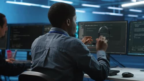 Software Developers Working at Computers in Modern Office