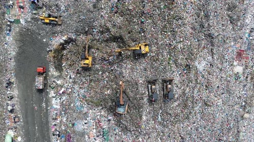 Aerial View of Excavators Working at Large Landfill Waste Management Site
