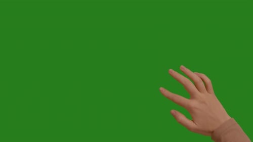 Gesten beim Wischen mit der weiblichen Hand auf dem Chroma-Key-Greenscreen-Hintergrund.