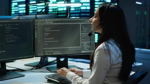 Worker in Server Farm Establishment Oversees Infrastructure Systems