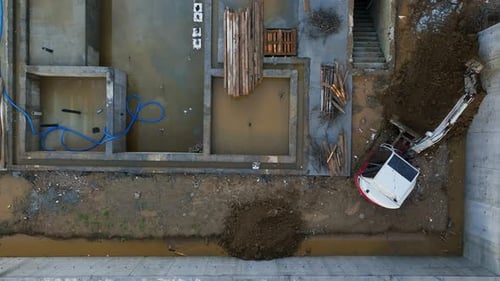 Aerial View of Excavator at Construction Site