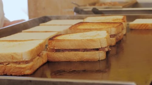 Chef Cooking Tuna Sandwich Cook Preparing a Tuna Eggs Salad Sandwich at the Ingredient Station of a