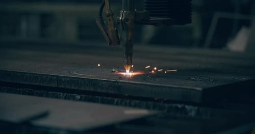 Close Up of Automated Metal Cutter Sparks