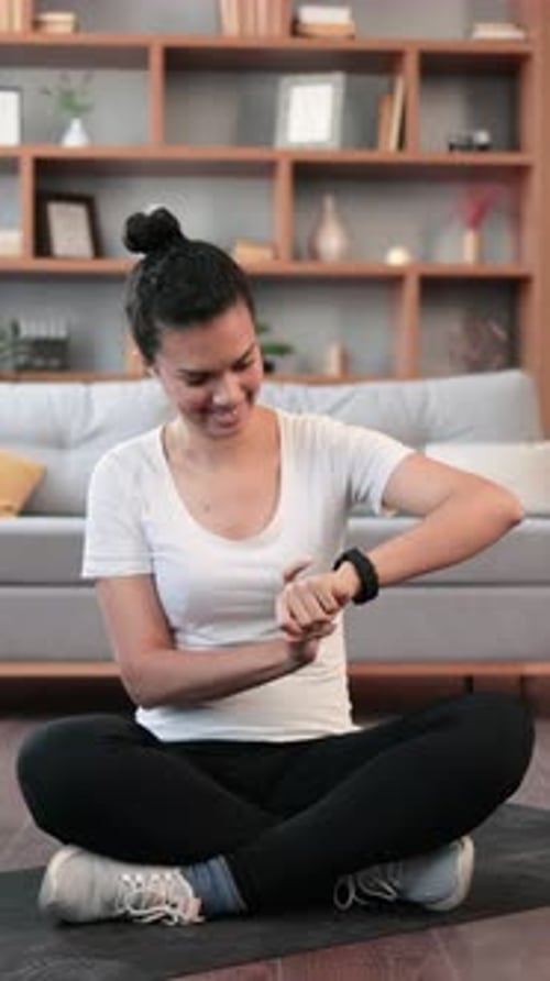 Woman Checking Smartwatch After Workout