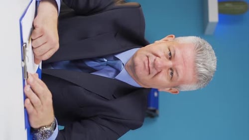 Man Talking in a Vertical Format Close Up