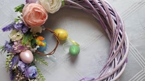 Springtime Wreath Decorated With Easter Eggs and Flowers