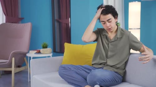 Angry and frustrated adolescent boy.