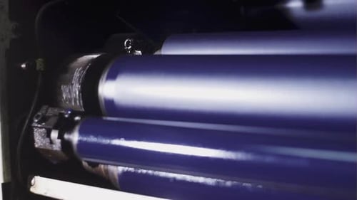 Part of the Old Printing Mechanism Causing Photo Shafts and Gears Moving Actively Twist in Printing