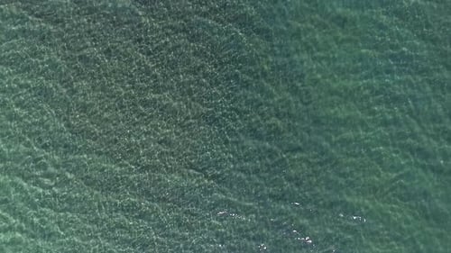Aerial Top View of Crystal Clean Water Sea Slow Motion