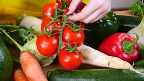 Fresh Vegetable Variety Close Up with Hand