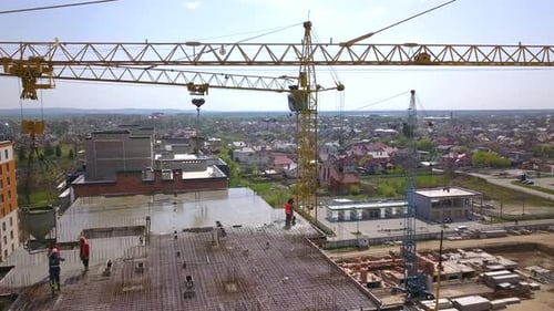 Aerial View of High Modern Residential Building and Tower Crane Under Construction
