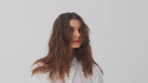 Model Poses Against a White Background