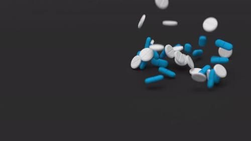 Animated Blue Capsules and White Pills Falling